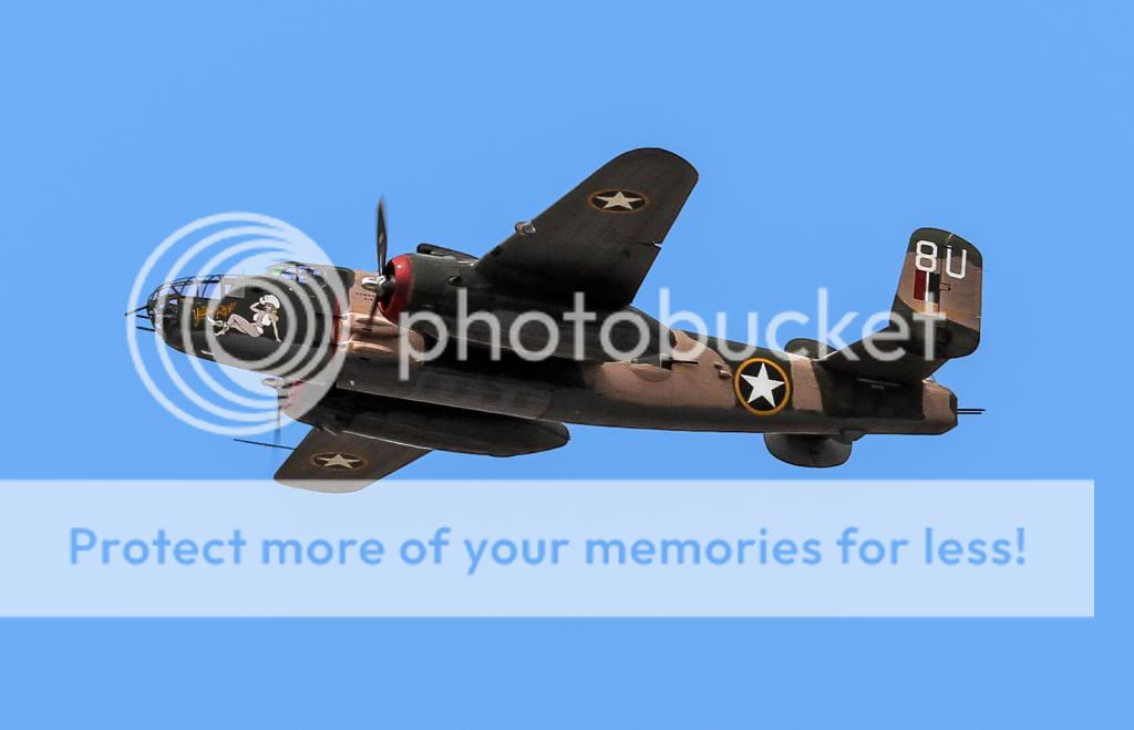 IMAGE: http://i1359.photobucket.com/albums/q781/EmeraldCoastPhotographer/Forum%20posts/Aviation/B-25DoolittleRaidersParade-9321edit_zps2d3b442b.jpg